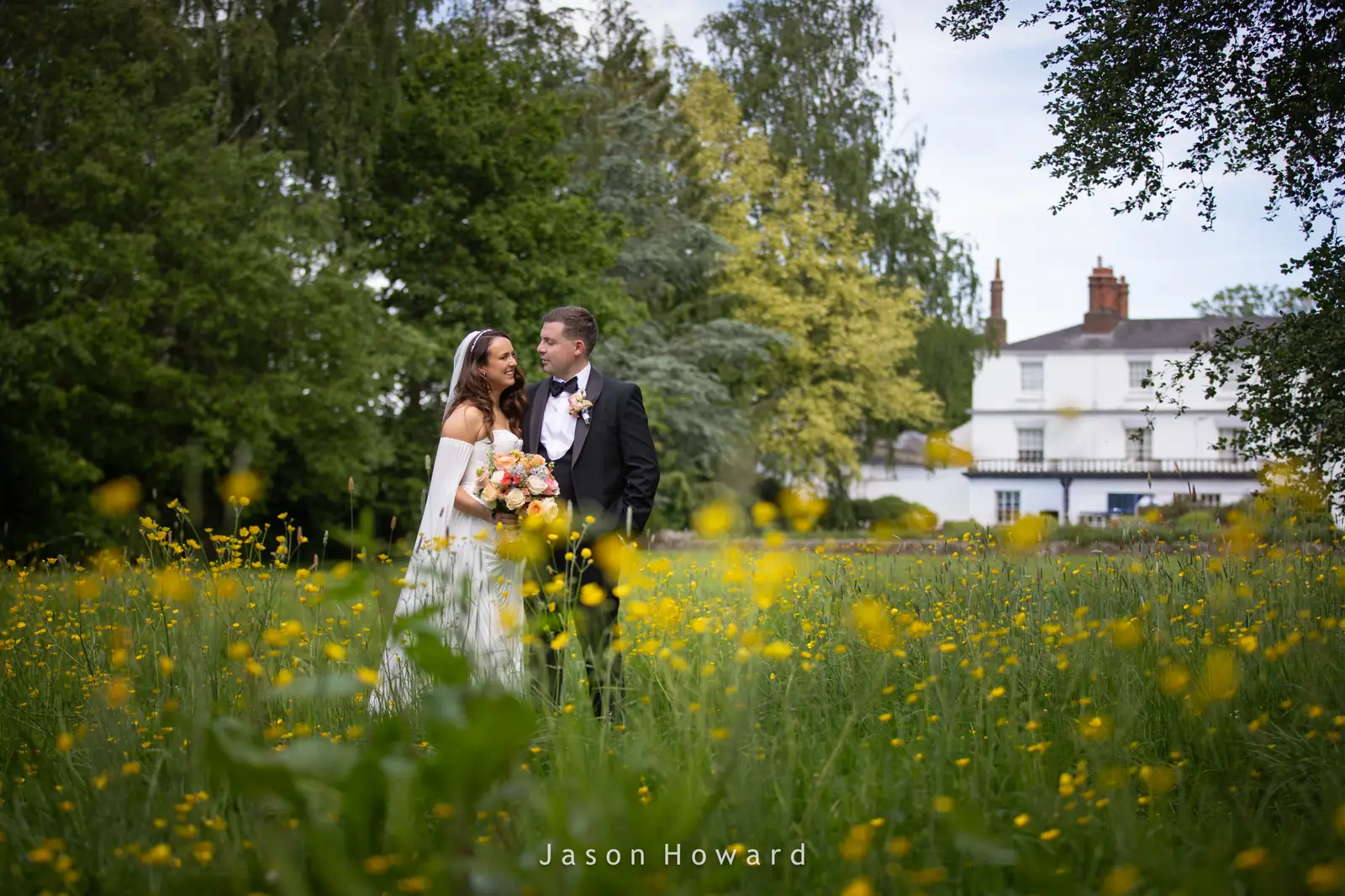 Summer wedding in the gardens at Rowton Hall Hotel, Cheshire