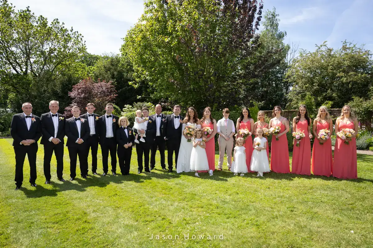 The wedding party celebrating at Rowton Hall Hotel, Chester